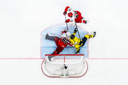 Goaltender Frederik Dichow and Nicholas B Jensen of Denmark