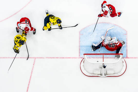 Marcus Johansson of Sweden scores the 3-0 goal behind