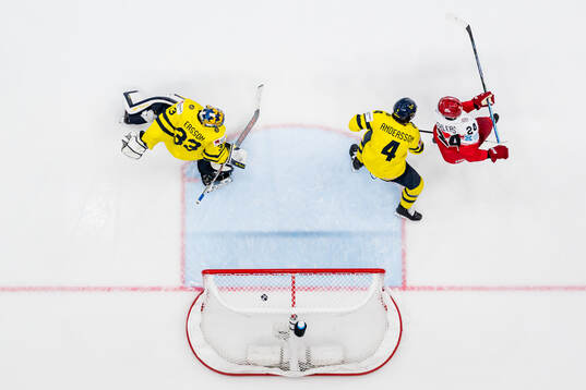 Nikolaj Ehlers of Denmark scores 4-2 past goaltender Samuel