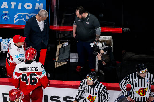 Head coach Mikael Gath of Denmark looks at a screen when a