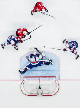 Nino Niederreiter and Kevin Fiala of Switzerland in action