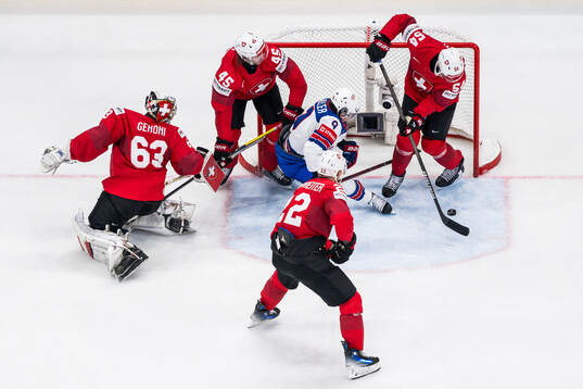 Goaltender Leonardo Genoni, Michael Fora, Nino Niederreiter
