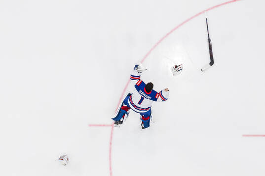 goaltender Jeremy Swayman of USA celebrates