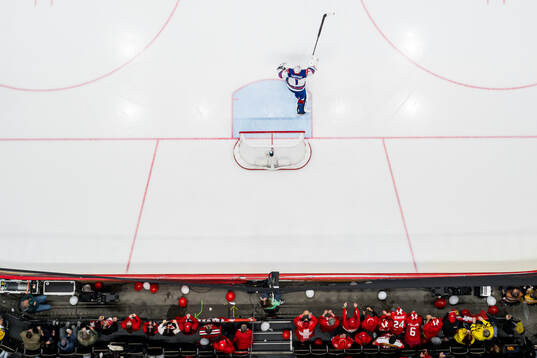 goaltender Jeremy Swayman of USA celebrates