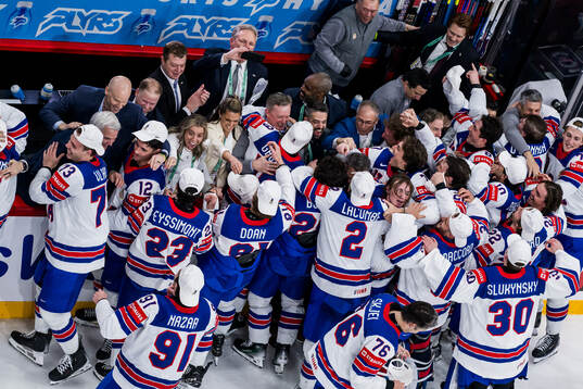 Players and staff of USA celebrate