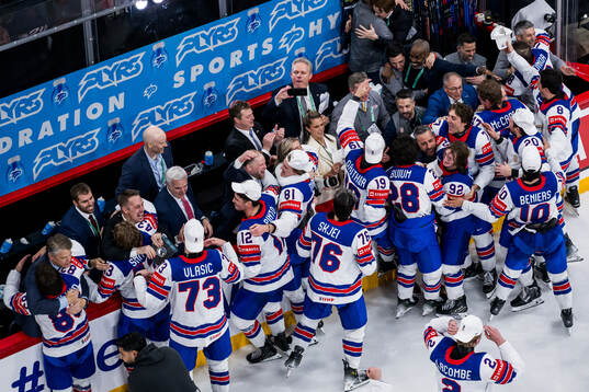 Players and staff of USA celebrate