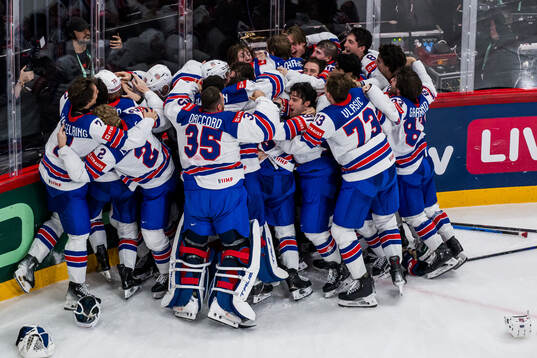 Tage Thompson of USA celebrates with team mates