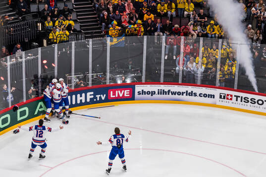 Tage Thompson of USA celebrates with team mates