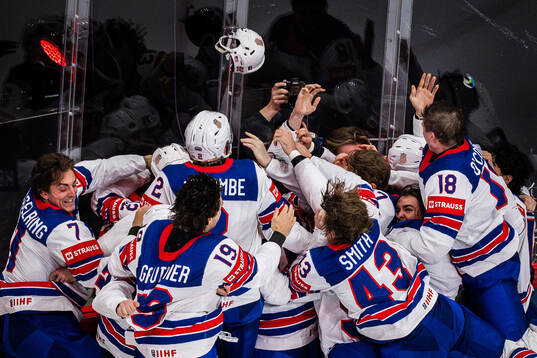 Tage Thompson of USA celebrates with his teammates