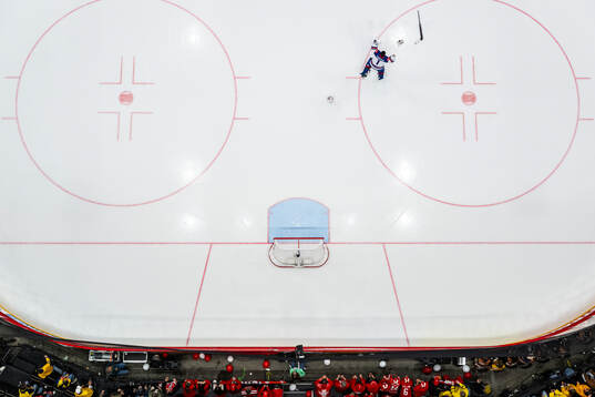 Goaltender Jeremy Swayman of USA celebrates the team’s