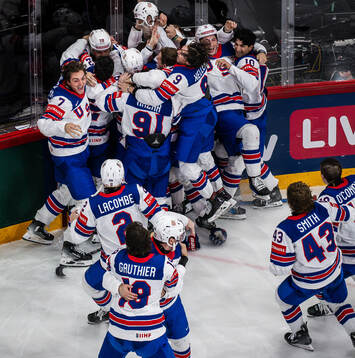 Tage Thompson of USA celebrates with his teammates