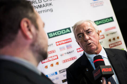Luc Tardif, IIHF President, is interviewed by members of