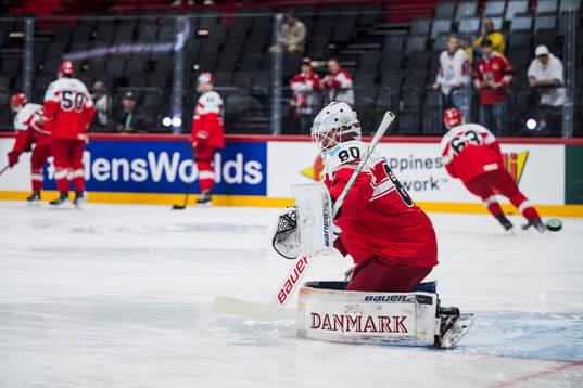 Goaltender Frederik Dichow of Denmark