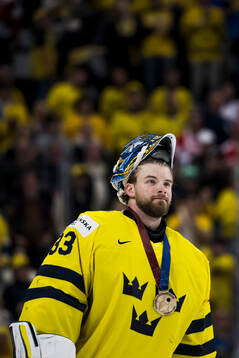Goaltender Samuel Ersson of Sweden with his bronze medal