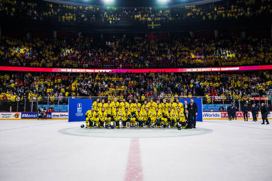 The players of Sweden pose for a bronze medal picture