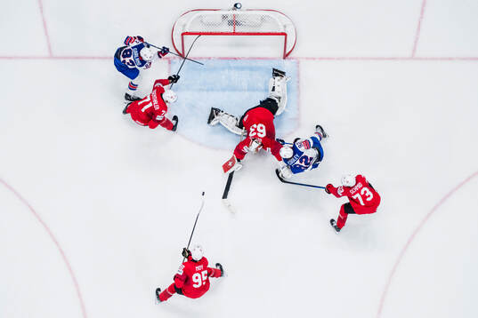 Goaltender Leonardo Genoni of Switzerland against Conor