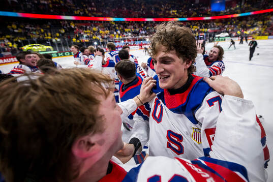 Tage Thompson of USA celebrates with team mates