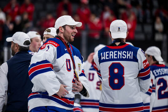 goaltender Jeremy Swayman of USA celebrates with his gold