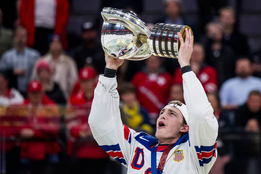 Tage Thompson of USA celebrates with t he trophy