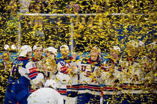 Conor Garland and Clayton Keller of USA celebrate with the