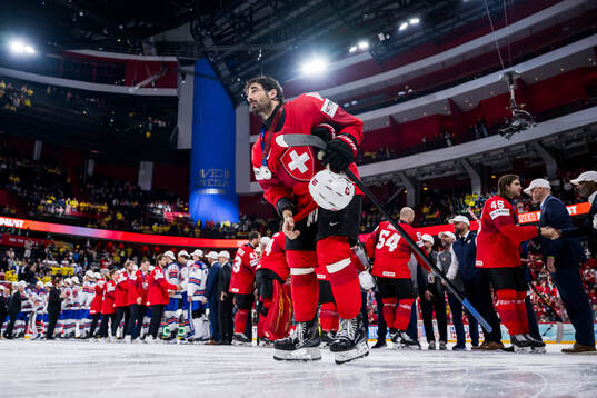 Andres Ambuhl of Switzerland looks dejected
