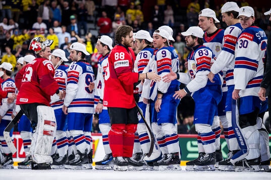 Andres Ambuhl of Switzerland looks dejected as he greets
