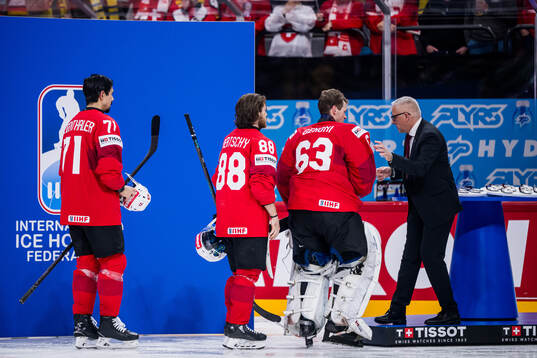 Goaltender Leonardo Genoni of Switzerland looks dejected as