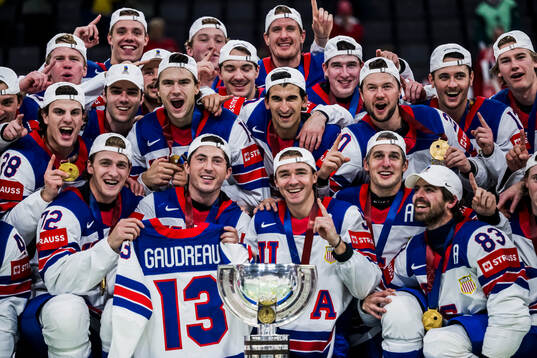 The players of USA celebrate with the jeresy of Johnny