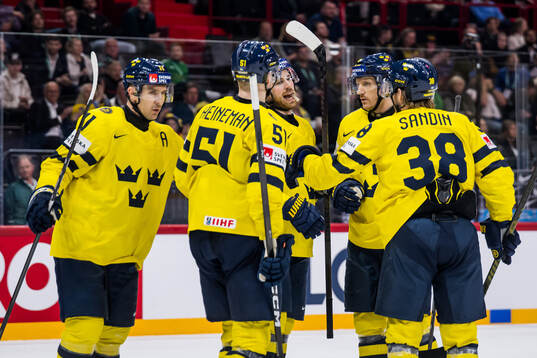 Mikael Backlund of Sweden celebrates with Emil Heineman,