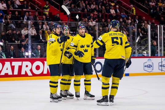 Mikael Backlund of Sweden celebrates with Emil Heineman,