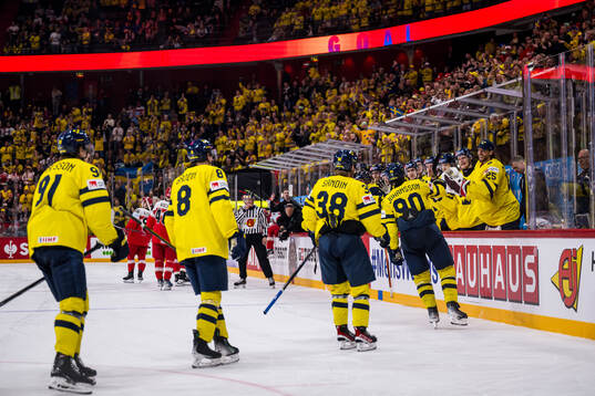Marcus Johansson of Sweden celebrates with team mates