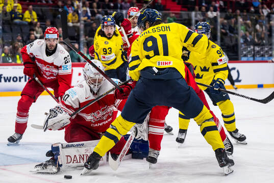 goaltender Frederik Dichow of Denmark against Mika