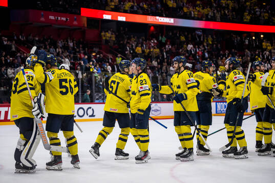 Players of Sweden celebrate