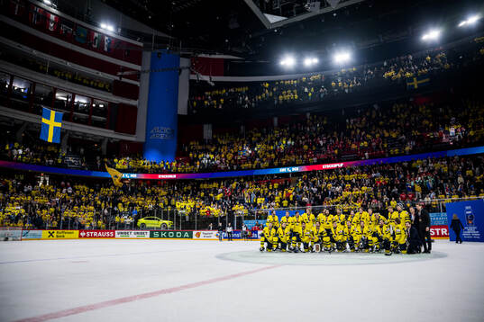 The Swedish team pose for a picture with their bronze medals