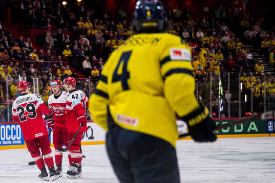 Nick Olesen of Denmark celebrates with team mates