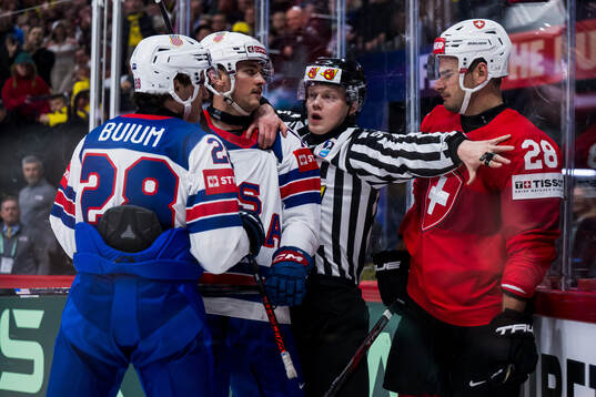 Timo Meier of Switzerland against Zeev Buium and Shane