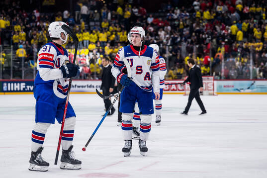 Logan Cooley of USA looks dejected