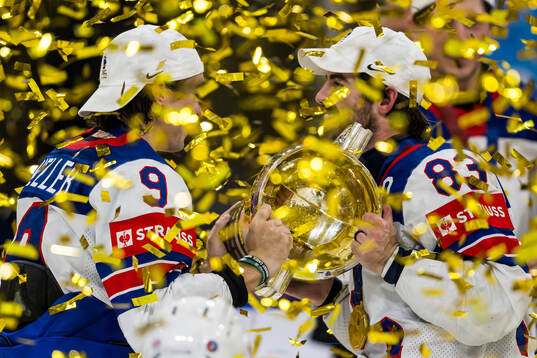 Clayton Keller and Conor Garland of USA celebrate with the