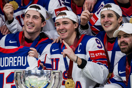 Clayton Keller of USA celebrates with the trophy