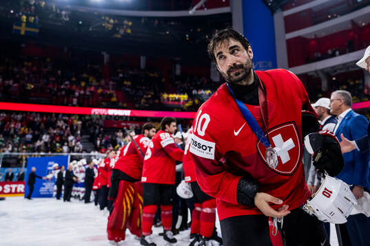 Andres Ambuhl of Switzerland looks dejected