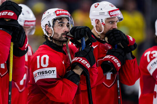 Andres Ambuhl of Switzerland looks dejected