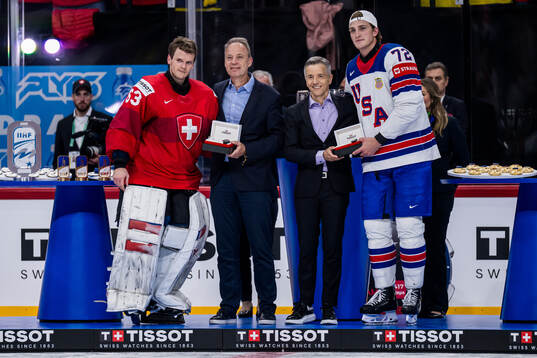 goaltender Leonardo Genoni of Switzerland and Tage Thompson