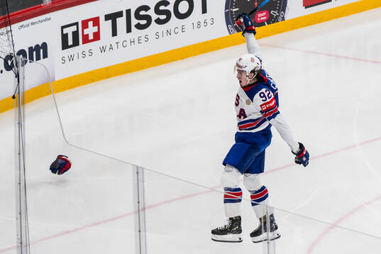 Logan Cooley of USA celebrates