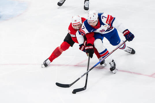 Sven Andrighetto of Switzerland and Michael Kesselring of