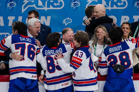 Head coach Ryan Warsofsky of USA celebrates with players