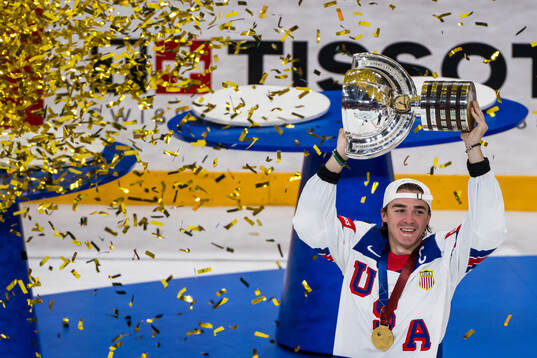 Clayton Keller of USA celebrates with the trophy