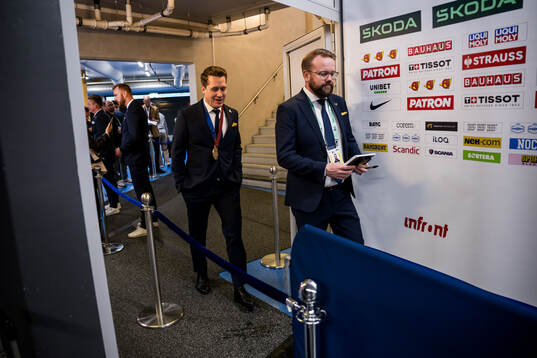 Head coach Sam Hallam of Sweden walks in to the mixed zone
