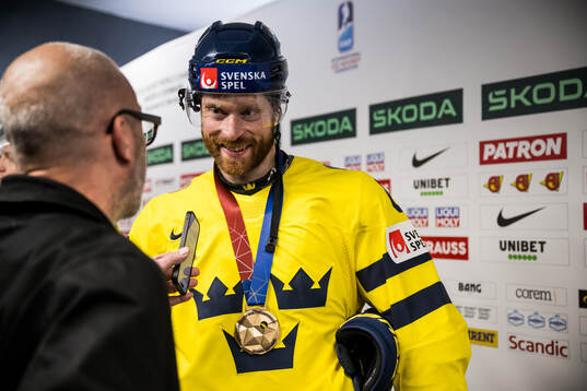 Adam Larsson of Sweden is being interviewed