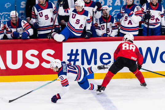 Matty Beniers of USA and Christoph Bertschy of Switzerland