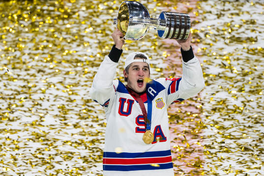 Brady Skjei of USA celebrates with t he trophy